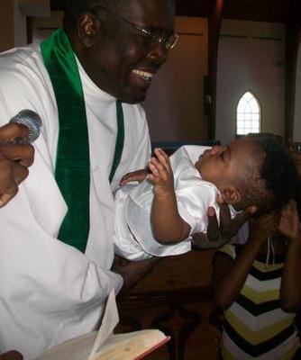 Haitian worshipping community baptism